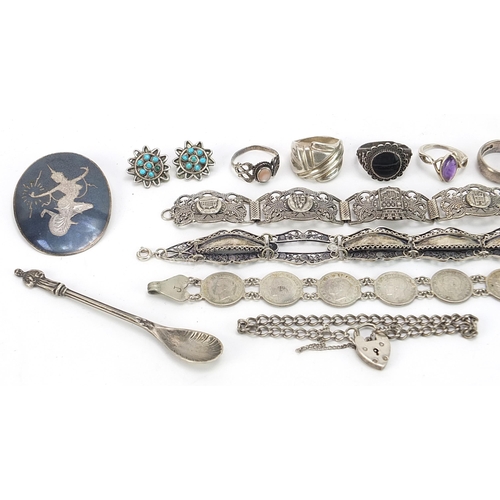 2033 - Silver jewellery including a Siam niello work brooch, bracelets and rings, 110.5g