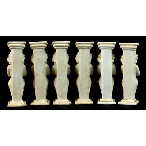 1128 - Set of six Victorian parian ware Putti cake stands, 9cm high