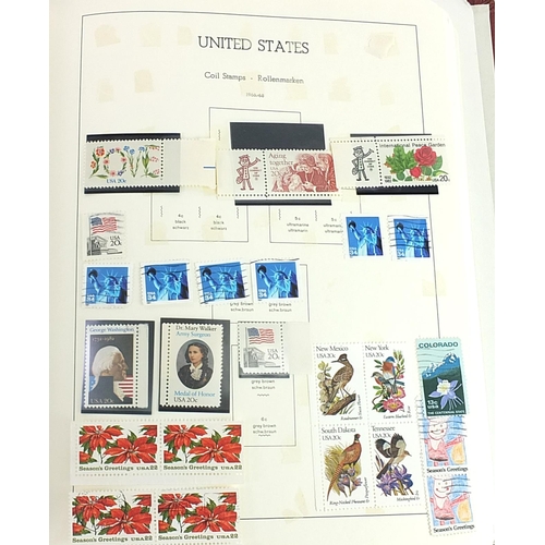 1539 - Collection of USA stamps arranged in an album including some mint