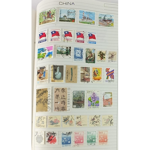 1526 - Collection of Empire and Commonwealth stamps arranged in an album including some mint