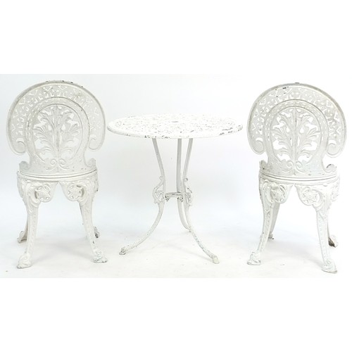 818 - White painted aluminium garden table and two chairs, the table 61cm high x 60cm in diameter