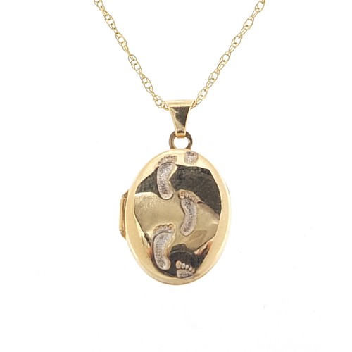 2016 - 9ct gold oval footprint locket on a 9ct gold necklace, 2.3cm high and 44cm in length, 1.8g