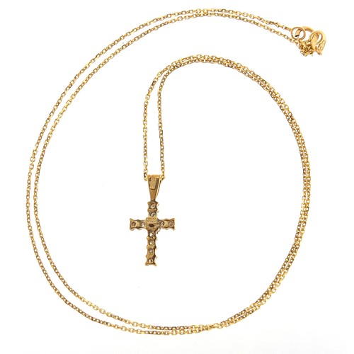 1955 - 9ct gold diamond cross pendant on a 9ct gold necklace, 1.6cm high and 45cm in length, 1.6g