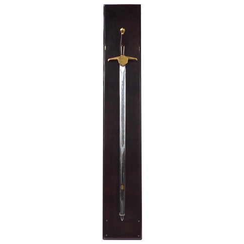 2358 - Masonic interest Wilkinson ceremonial sword with wall mounted display stand, the sword 87cm in lengt... 