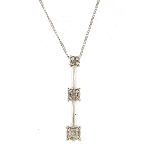 1797 - 9ct white gold graduated diamond pendant on a 9ct gold necklace, the pendant stamped 0.10, 2.2cm hig... 