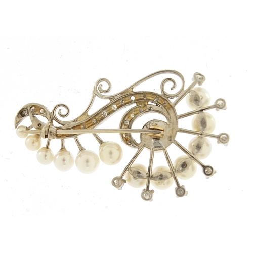 1643 - Palladium diamond and cultured pearl brooch housed in a Cadari box, 4.2cm wide, 7.3g