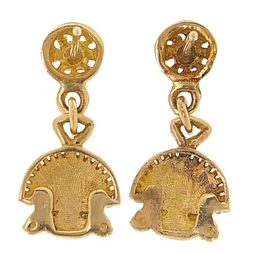 1710 - Pair of unmarked gold face mask drop earrings with green stone eyes, 2.2cm high, 4.5g