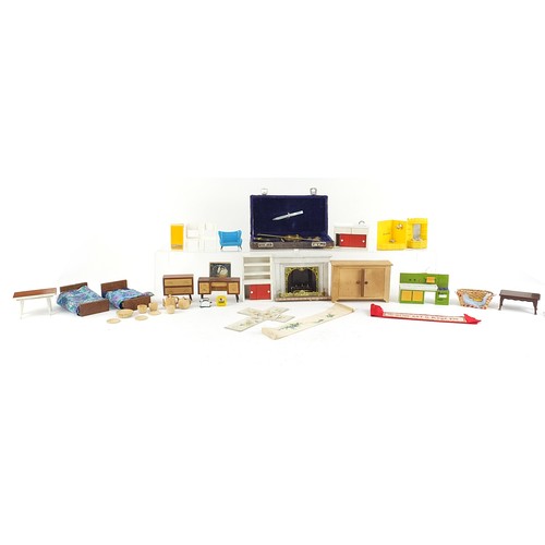 997 - Vintage and later doll's house furniture, a selection of rules and cased set of brass scales, the la... 