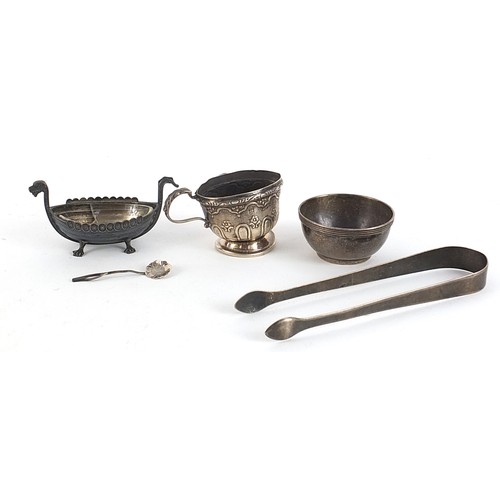 2279 - Georgian and later silver objects including a pair of sugar tongs, Arts & Crafts circular salt and a... 