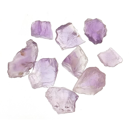 2114 - Group of rough amethyst gemstones with certificate, approximately 44.050 carat