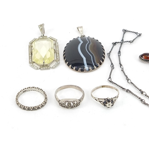 2108 - Silver jewellery including a large amber cross pendant on necklace, marcasite rings, agate pendant a... 