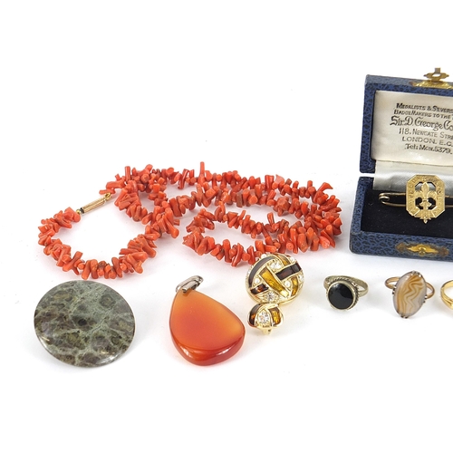 2113 - Vintage and later jewellery including a 9ct gold smoky quartz ring, carnelian pendants, coral neckla... 