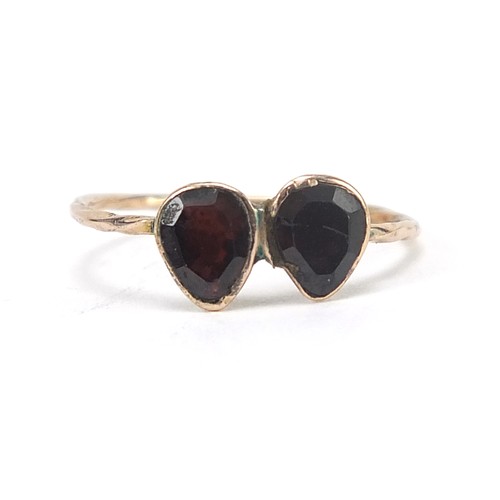 2053 - Antique unmarked gold garnet double tear drop ring housed in a T L Godfrey leather box, size I/J, 0.... 