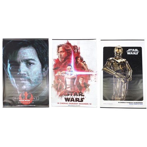 1300 - Three large Star Wars cinema film banners, comprising Rise of Skywalker, Rogue One and The Last Jedi... 