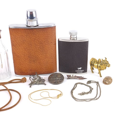 1234 - Objects including silver napkin ring, silver mounted scent bottle and hip flasks, the largest 15cm h... 