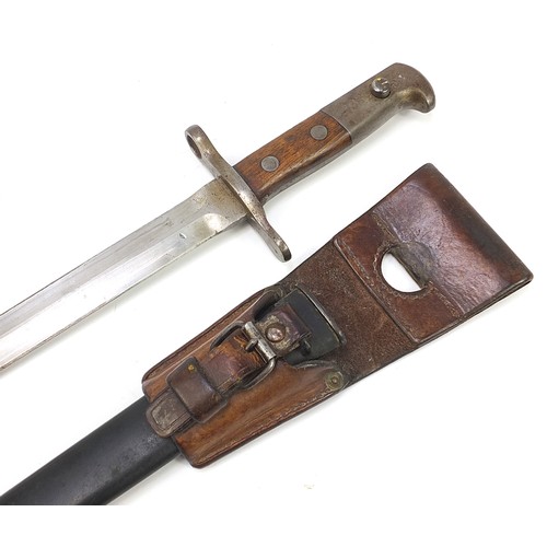 2360 - Swiss military interest bayonet with scabbard and leather frog, the steel blade impressed Waffenfabr... 