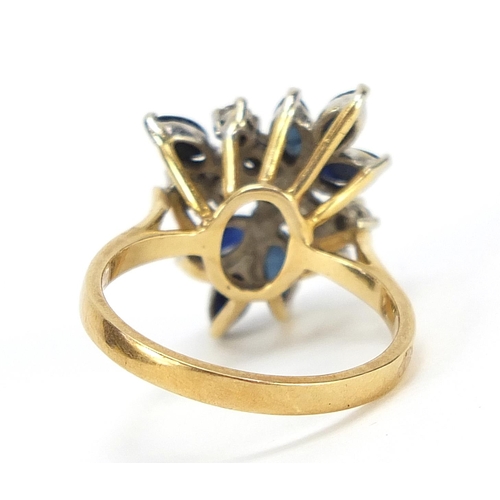 1976A - Unmarked gold diamond and sapphire flower head ring, size P, 5.6g