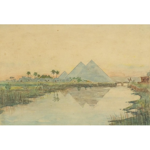 558 - Egyptian landscapes including pyramids, sphinxes and ruins, set of three early 20th century heighten... 