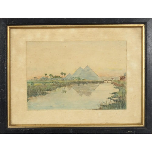 558 - Egyptian landscapes including pyramids, sphinxes and ruins, set of three early 20th century heighten... 