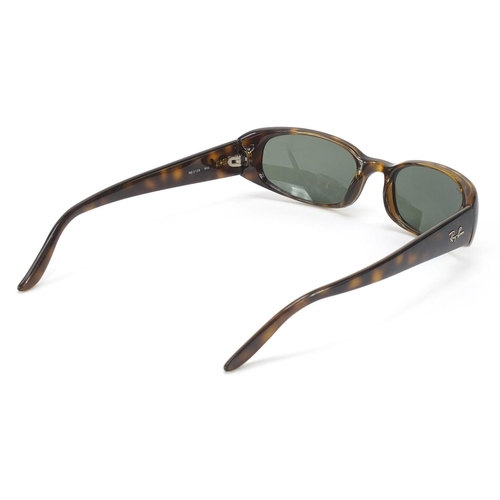 572 - Cased pair of Ray-Ban tortoiseshell design sunglasses with cleaning cloth