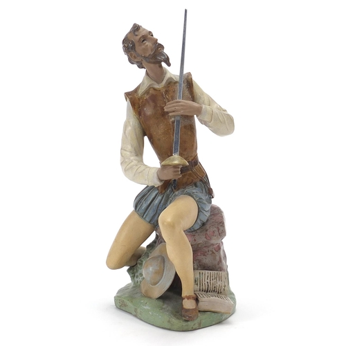 450 - Lladro gres figure of Don Quixote with sword, 23cm high