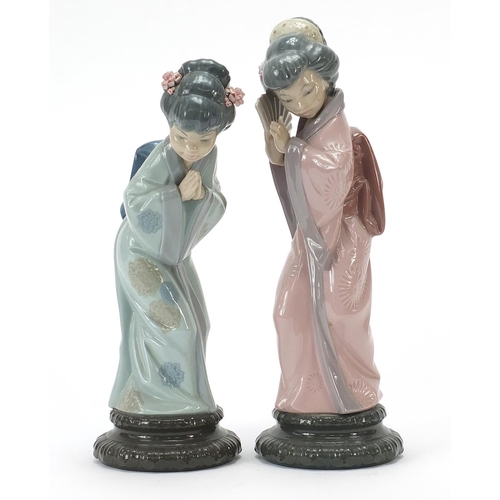 451 - Pair of Lladro figurines of Japanese Geishas, the largest 30cm high