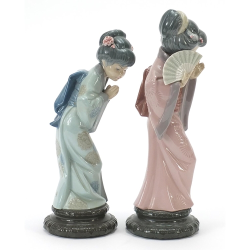 451 - Pair of Lladro figurines of Japanese Geishas, the largest 30cm high