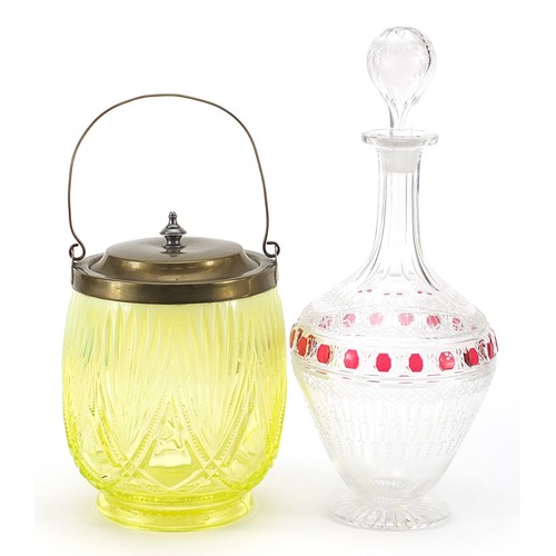 591 - 19th century ruby flashed glass decanter and a uranium glass biscuit barrel, the largest 31.5cm high