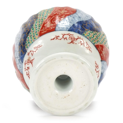 590 - Japanese Imari porcelain pedestal bowl hand painted with flowers, 13cm high x 15cm in diameter