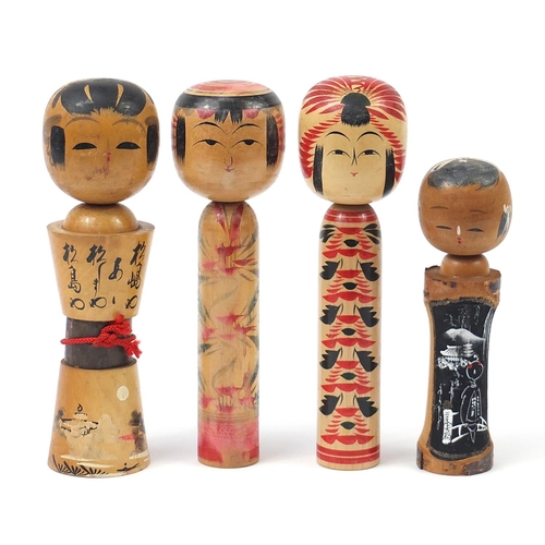 592 - Four Japanese Kokeshi dolls, the largest 31cm high