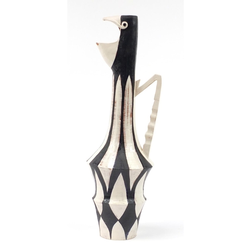 490 - Contemporary hand painted pottery pitcher in the form of a bird, 56.5cm high