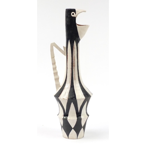 490 - Contemporary hand painted pottery pitcher in the form of a bird, 56.5cm high