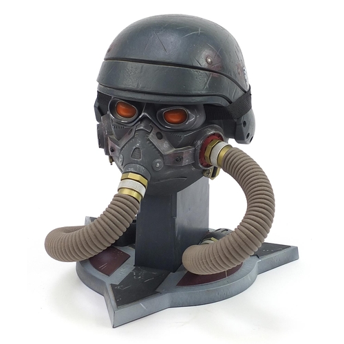 852 - The Art of Killzone 3 collector's book with pilots helmet display stand