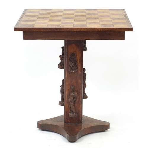 873A - Hardwood chess table, the base with applied classical figures, 58.5cm H x 53cm W x 53cm D