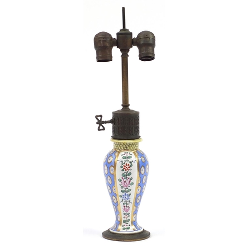 505 - Continental porcelain baluster lamp base with bronzed mounts hand painted with flowers, 47cm high