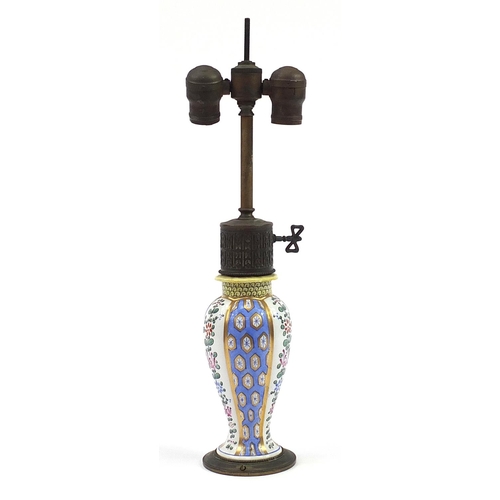 505 - Continental porcelain baluster lamp base with bronzed mounts hand painted with flowers, 47cm high