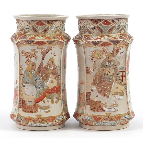 116 - Pair of Japanese Satsuma pottery vases hand painted with seated figures, 25cm high