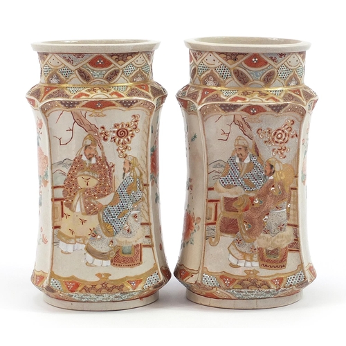 116 - Pair of Japanese Satsuma pottery vases hand painted with seated figures, 25cm high