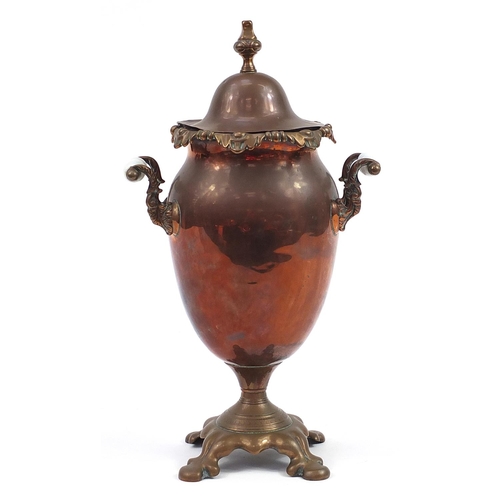 256 - 19th century copper samovar with brass tap and ceramic handles, the lid marked Warranted Best London... 