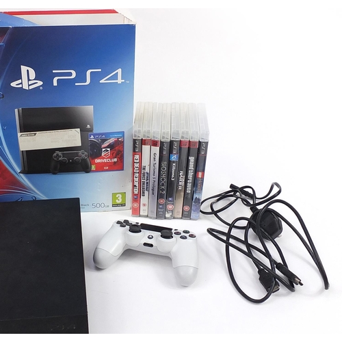 1181 - PlayStation 4 games console with a collection of PlayStation 4 and PlayStation 3 games