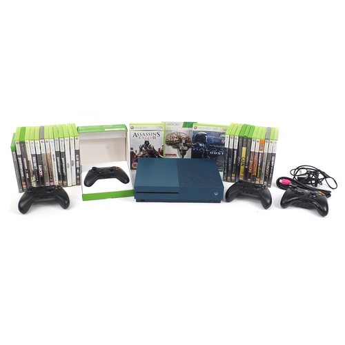 1180 - X Box One S games console with controllers and a collection of X Box and X Box 360 games