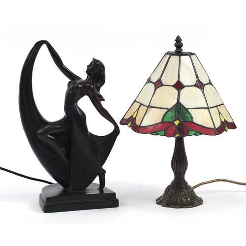 527 - Bronzed Tiffany design table lamp with leaded glass shade and an Art Deco dancer table lamp, the lar... 