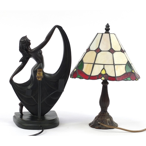 527 - Bronzed Tiffany design table lamp with leaded glass shade and an Art Deco dancer table lamp, the lar... 