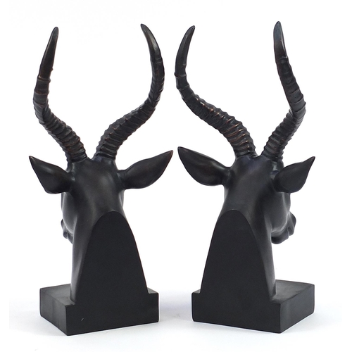 524 - Pair of bronzed gazelle head bookends, 38cm high