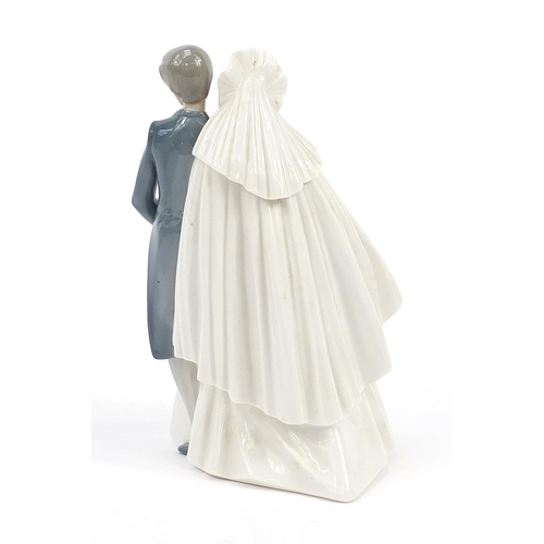 447 - Nao porcelain bride and groom figure group with box number 01247, 26.5cm high