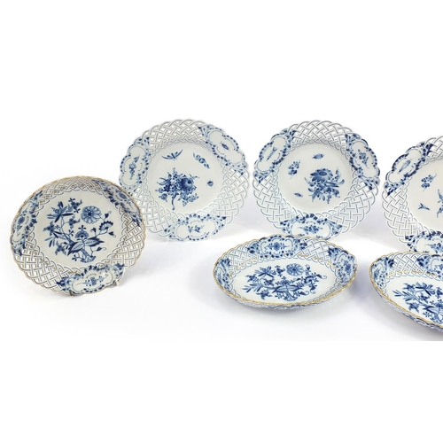 348 - Meissen, German blue and white porcelain including four plates hand painted with flowers and pair of... 