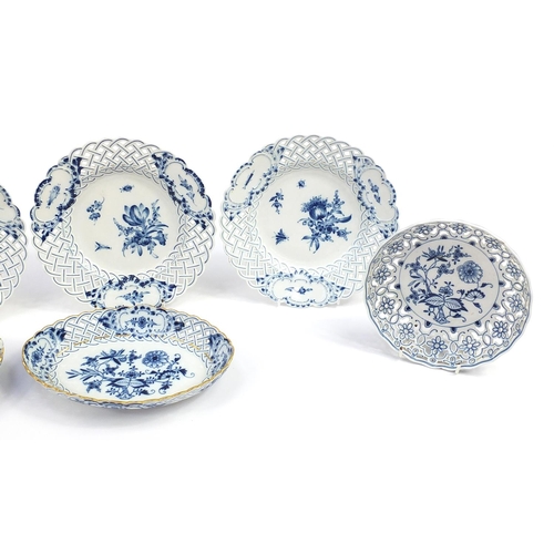 348 - Meissen, German blue and white porcelain including four plates hand painted with flowers and pair of... 