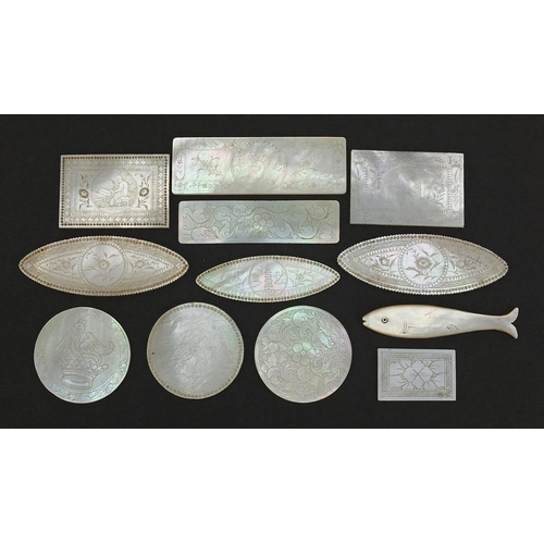 566 - Eleven Chinese Canton mother of pearl gaming counters and one other, the largest 6.5cm wide