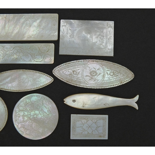 566 - Eleven Chinese Canton mother of pearl gaming counters and one other, the largest 6.5cm wide