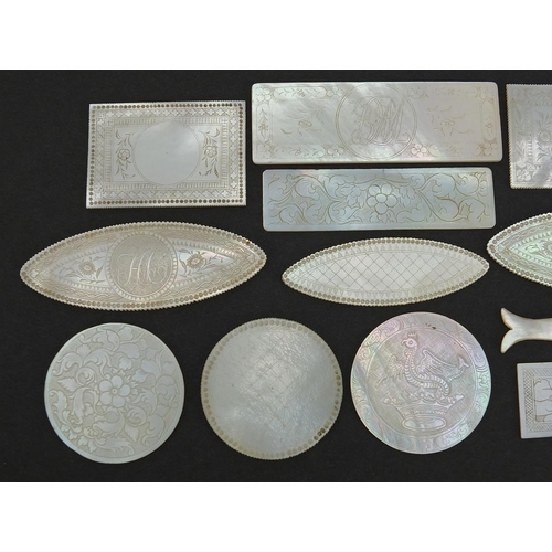 566 - Eleven Chinese Canton mother of pearl gaming counters and one other, the largest 6.5cm wide